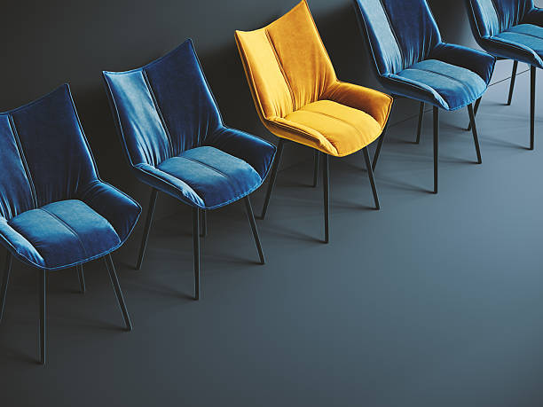 istock Hiring concept design. One empty yellow chair among many. One spot left. 2201248915