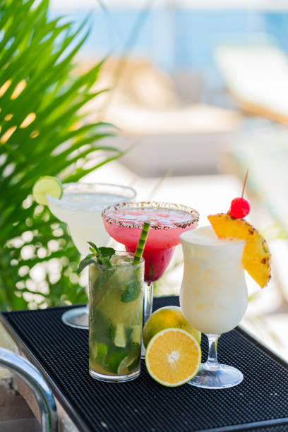 istock Very delicious cocktails by the pool 2201252010