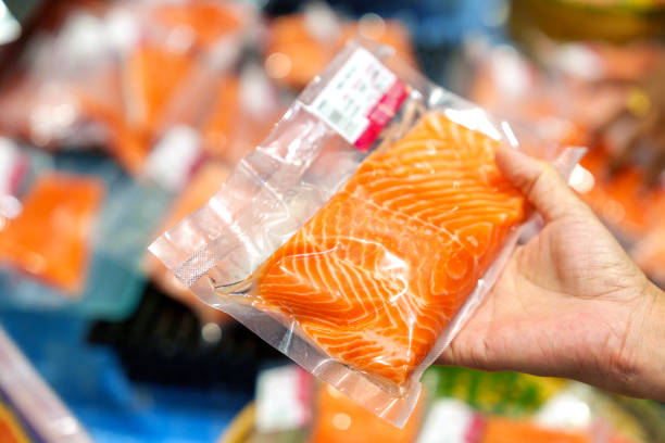 istock Fresh Vacuum-Packed Salmon at Local Groceries Store 2201264520
