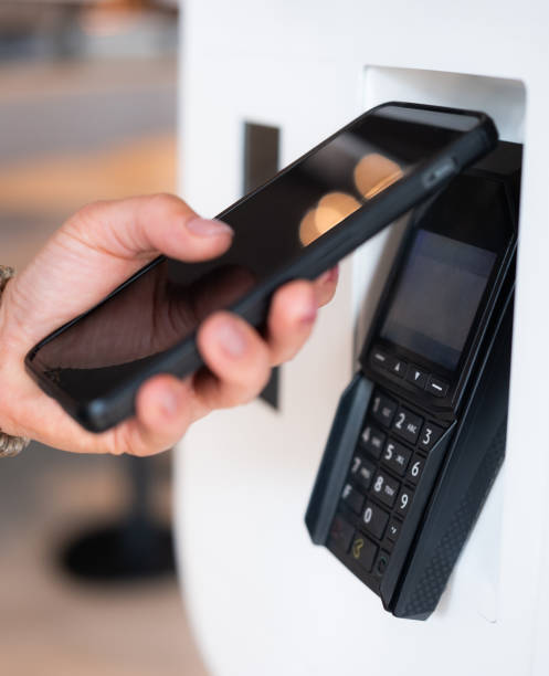 istock Customer Using Smartphone To Contactless Payment In Shop 2201267701