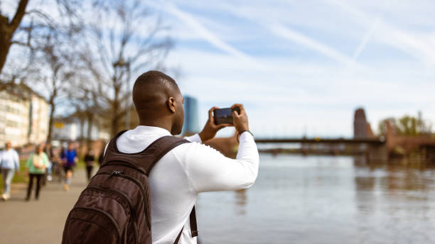 istock Traveler Capturing Scenic Riverside 2201271638