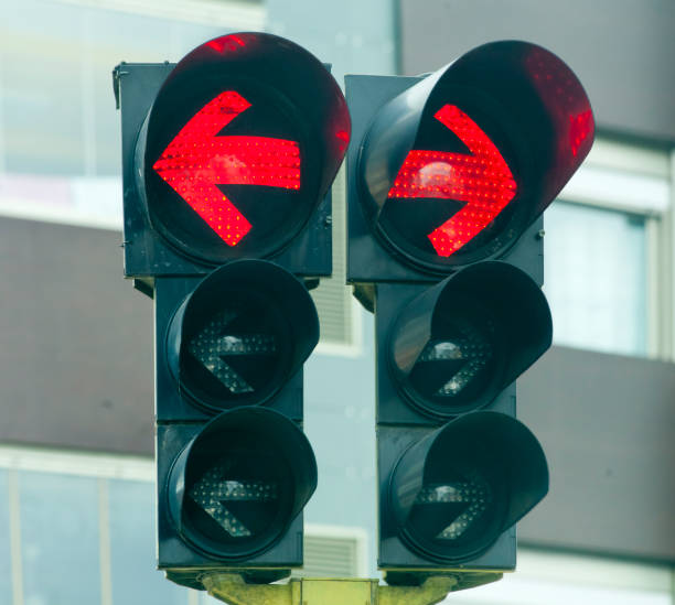 istock Red traffic lights, stop lights, arrow symbols . 2201271721