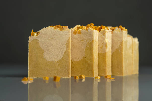 istock handmade soap orange color on a gray background flowers pumpkin orange mango 2201273248