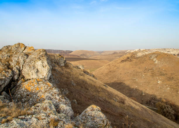 istock Small river and hills in prairie 2201273429