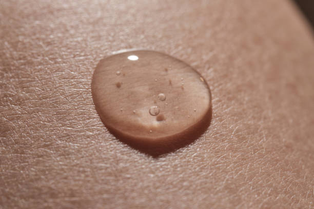 Body fluid or cosmetic gel on human skin. High quality photo.