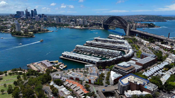 Aerial Port Jackson known as Sydney Harbour. Sydney Harbour Bridge is it the largest steel arch bridge on the planet. The Sydney Opera House