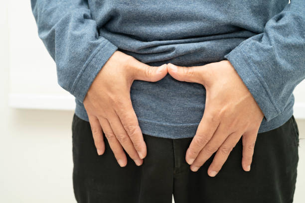 istock Hernia, Asian man stomach ache, abdominal pain and urology problem health. 2201284010