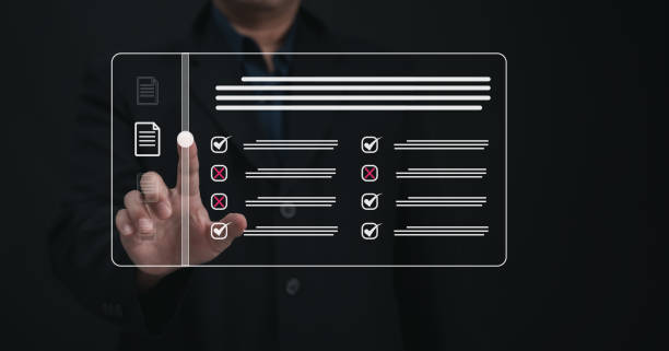 istock Performance checklist concept : businessman using finger with mobile phone for questionnaire, evaluation, assessment online or survey exam and filling out for digital survey and checklist. 2201285063