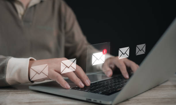 istock Business man using laptop with notification virtual mail or message alert for social media , chat , email , message for digital marketing. 2201285226
