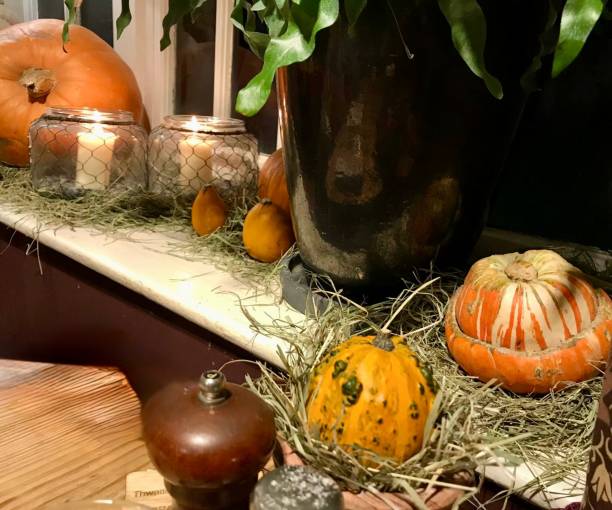 istock Warm Autumnal Still Life with Pumpkins and Candlelight 2201294050
