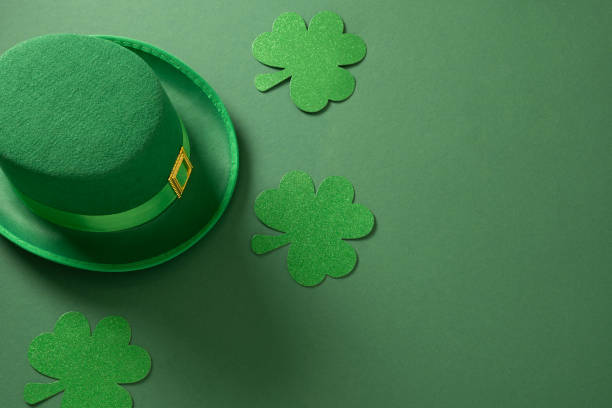 istock St Patricks day concept with Leprechaun Hat on green background. 2201300336