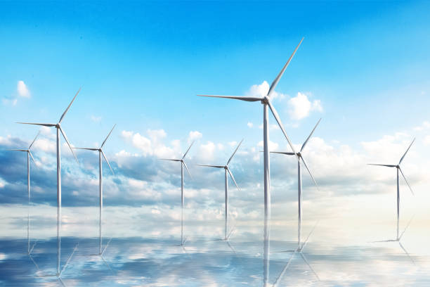 istock Wind turbine generator against blue cloudy sky. Alternative eco energy technologies and environmental business 2201310772
