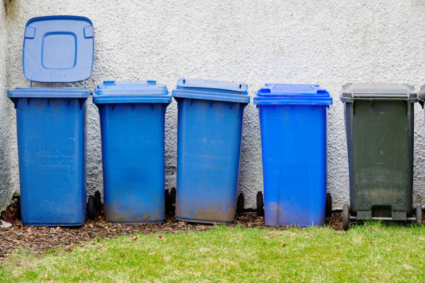 istock Wheelie bins in row for refuge collection outdoors 2201314754