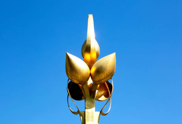 Shot in color detail on the facade of this historic building representing some character, animal or flower. Set at Bangkok, Thailand, Asia