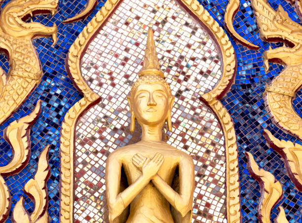 Shot in color detail on the facade of this historic building representing some character, animal or flower. Set at Bangkok, Thailand, Asia