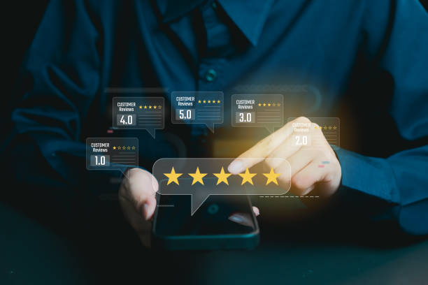 istock User Engaging with Smartphone for Customer Reviews and Ratings, business concept 2201318647