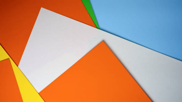 istock Brightly colored sheets of paper arranged in vibrant patterns 2201319304