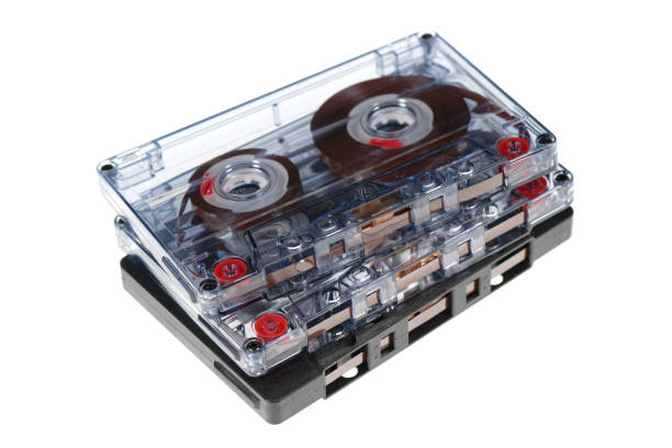 Stack of retro audio cassettes isolated on white background, 80's music concept