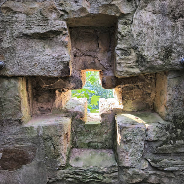 istock A beautiful sunlit stone cross window framed by historical ruins exudes timeless charm and allure Deister Bad Nenndorf 2201328616