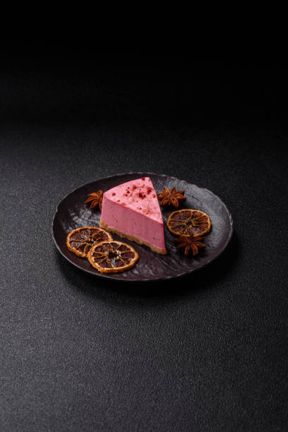 istock A piece of sweet cheesecake with raspberry or strawberry flavor 2201329645