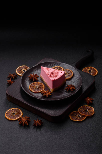 istock A piece of sweet cheesecake with raspberry or strawberry flavor 2201329672