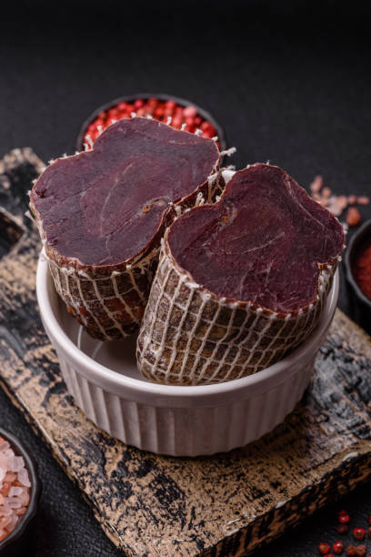 istock Smoked horse meat with salt, spices and herbs 2201330089