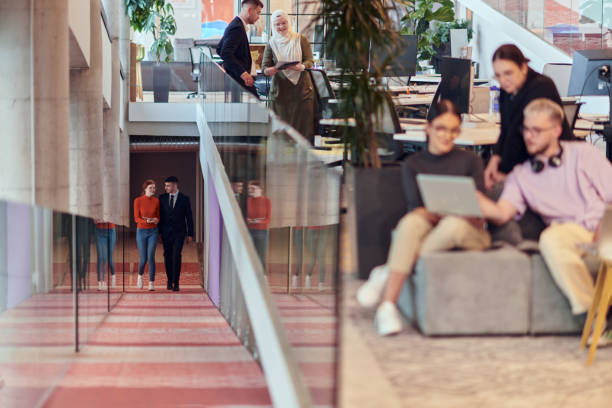 istock In a modern startup office, a diverse group of young professionals collaboratively tackles various business problems and challenges, surrounded by their engaged colleagues, fostering innovation and productivity 2201330369