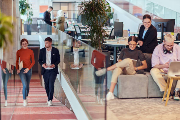 istock In a modern startup office, a diverse group of young professionals collaboratively tackles various business problems and challenges, surrounded by their engaged colleagues, fostering innovation and productivity 2201333840