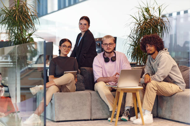 istock In a modern startup office, a diverse group of young professionals collaboratively tackles various business problems and challenges, surrounded by their engaged colleagues, fostering innovation and productivity 2201334446