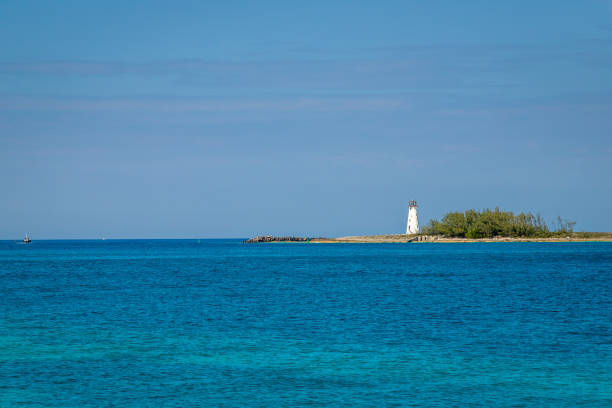 Exposure of Nassau entrance port, showing the light blue waters, the light blue is a response to sunlight reflecting off the sand and corals on the bottom, Bahamas