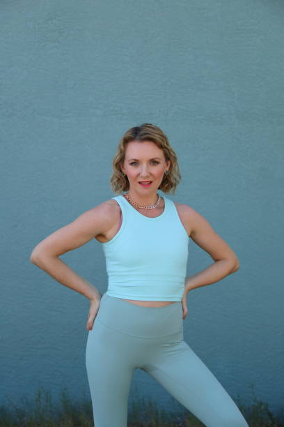 istock Woman in sport outfit on front different backgrounds 2201340440