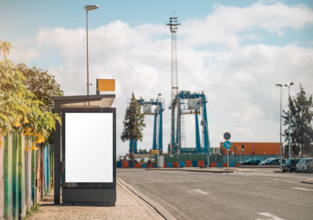 istock Bus stop ad mockup near port cranes 2201341434