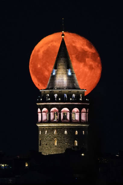 istock Galata Tower and Full Moon in Istanbul, Turkiye 2201347626