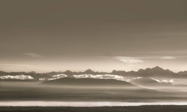 Landscape photography of the Swiss Alps and  Lake Geneva, minimalism, sepia toned, copy space, 16:9