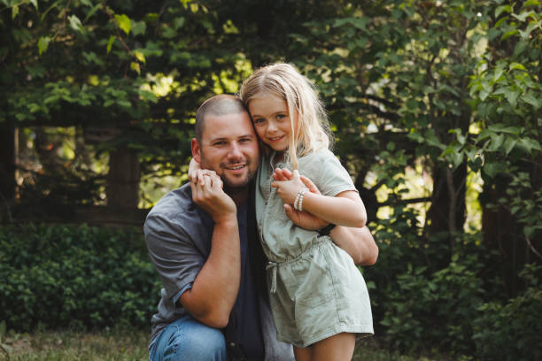 istock Father and Daughter Outside 2201351455