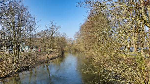 istock A breathtaking scenic river view surrounded by lush trees under a bright blue sky, Hannover Maschsee 2201354872