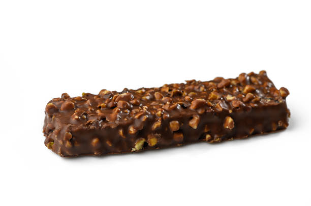istock Delicious chocolate bar with crunchy nuts and a smooth coating for a perfect treat 2201356463
