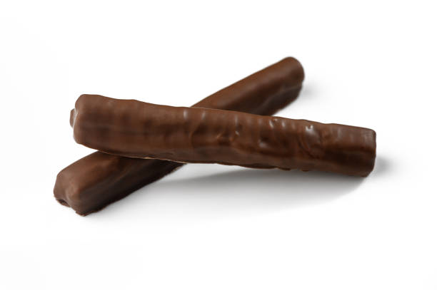 Delicious chocolate bars stacked invitingly on a clean surface awaiting indulgence