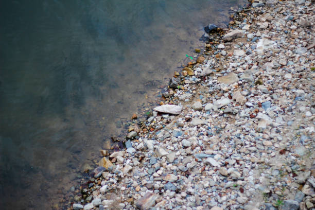river stones, rocks on the edge of the river