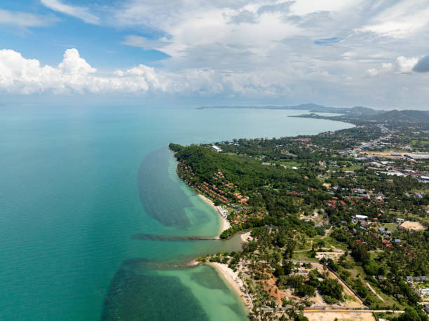 istock Coastal view with lush greenery and turquoise waters. Koh Samui, Thailand. 2201393178