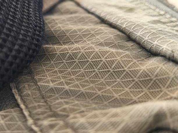 istock different fabric fibers from clothes, pants and hats 2201396992