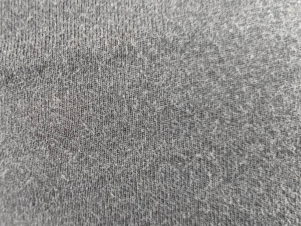 istock different fabric fibers from clothes, pants and hats 2201396998