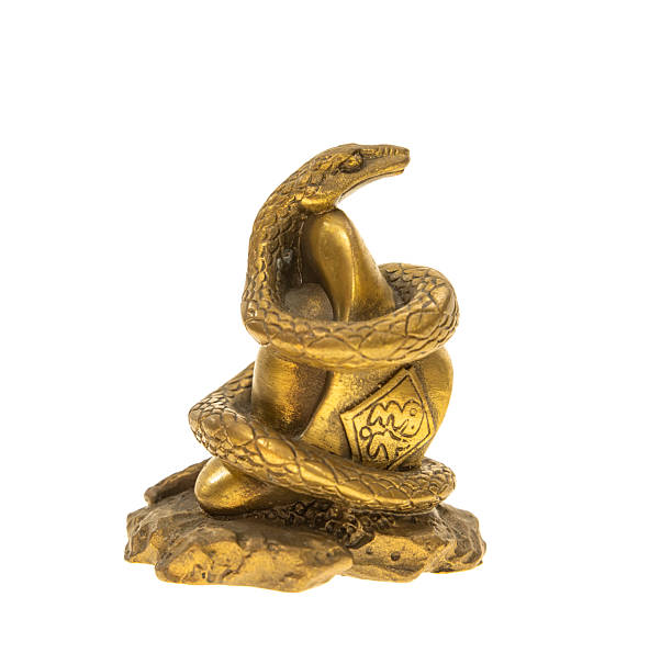 istock chinese new year concept with traditional snake statue isolated on white background 2201403485