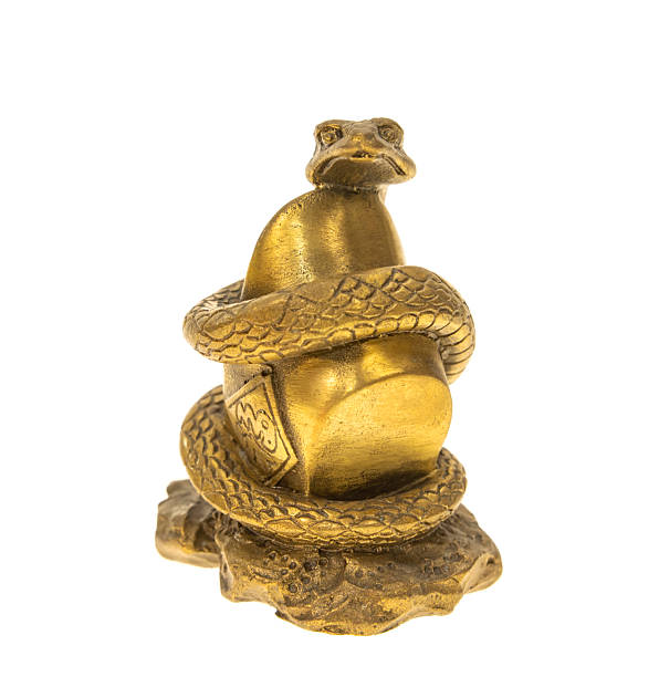 istock chinese new year concept with traditional snake statue isolated on white background 2201403723