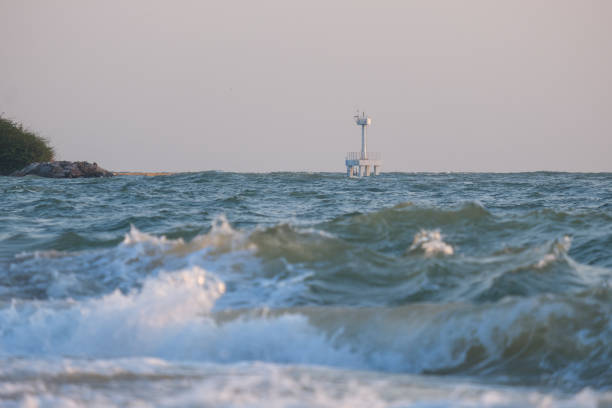 The sea is raging with big and dangerous waves.