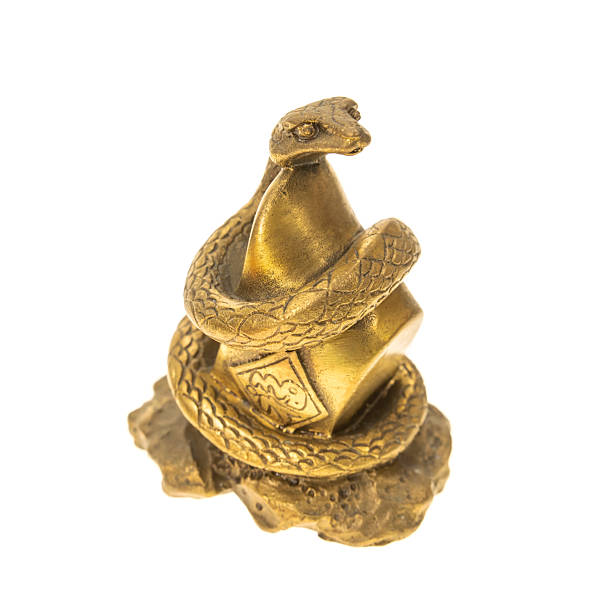 istock chinese new year concept with traditional snake statue isolated on white background 2201404399