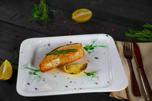 menu for the restaurant salmon trout steak red fish rosemary lemon sauce.