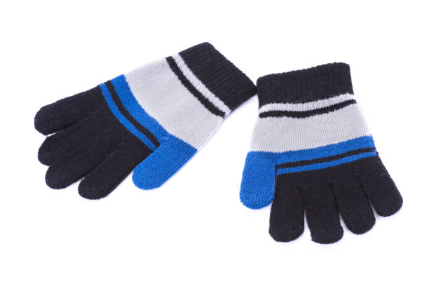 istock Kids knitted gloves isolated 2201423291