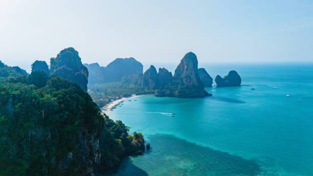 istock Captivating views of Railay Beach and limestone cliffs in Krabi, Thailand during a sunny day 2201423714