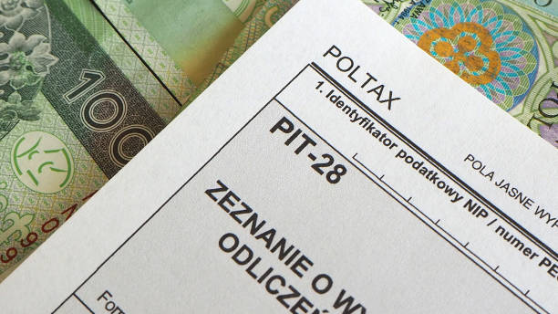 istock Polish banknotes and PIT28 tax form 2201425154